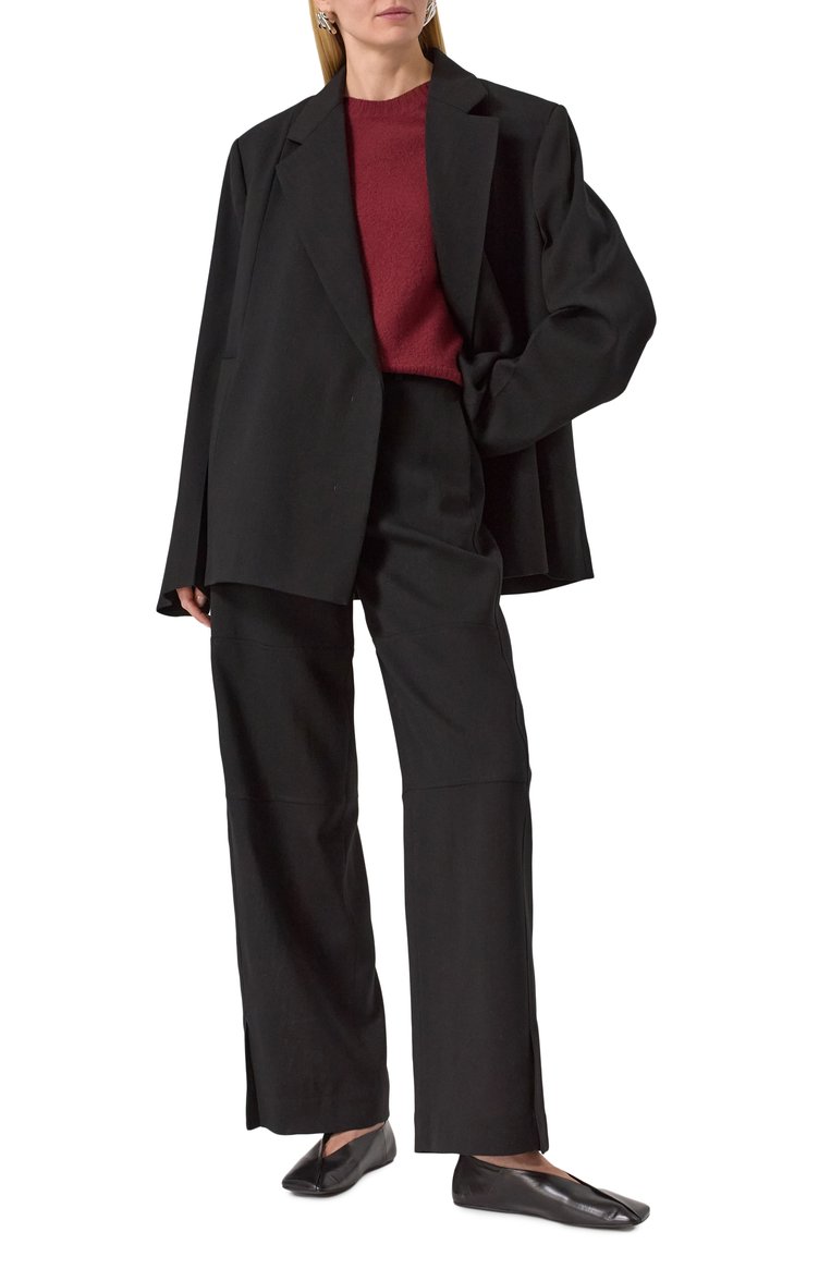 Женские шерстяные брюки JIL SANDER черного цвета, арт. J03KA0277-J40201 | Фото 2 (Длина (брюки, джинсы): Стандартные; Материал внешний: Шерсть; Случай: Формальный; Силуэт Ж (брюки и джинсы): Широкие; Женское Кросс-КТ: Брюки-одежда; Стили: Классический; Кросс-КТ: костюм; Автоматизация состава: Проставлено; Автоматизация ТО: Проставлено)